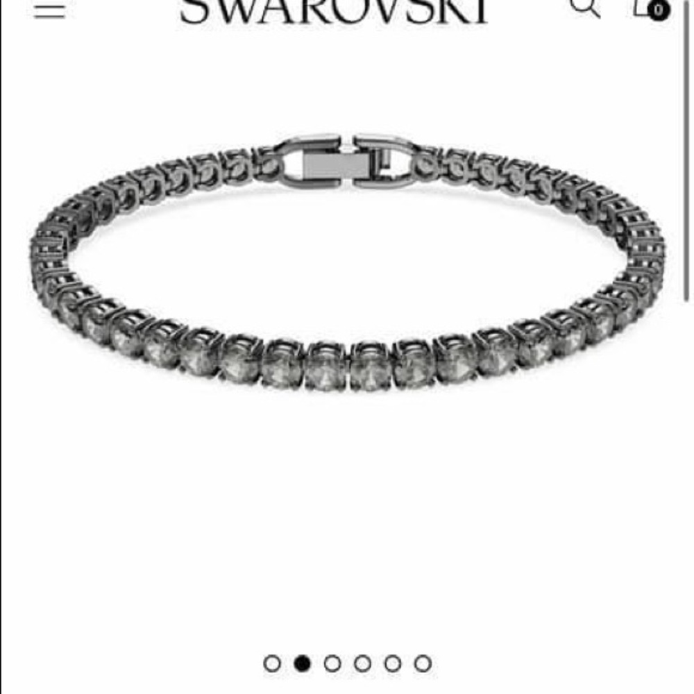 Swarovski tennis bracelet. Needs cleaned! Retails for $195